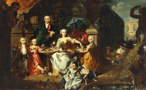 Een familie op een terras in de tuin van een villa. Mogelijk de Engelse zakenman George Jackson en zijn familie