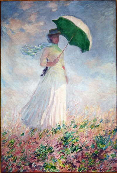 Vrouw met een parasol naar rechts gedraaid door Claude Monet